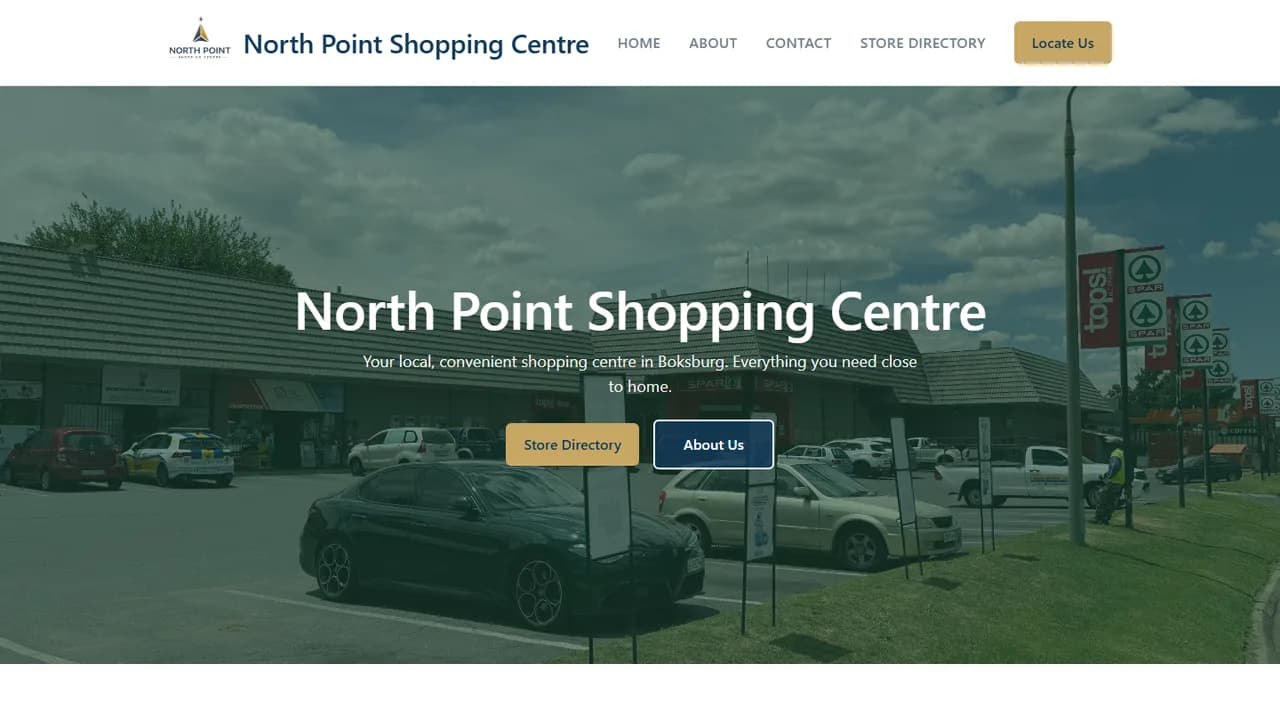 North Point Shopping Centre homepage — a photograph of the centre’s storefronts and parking behind the centre name.